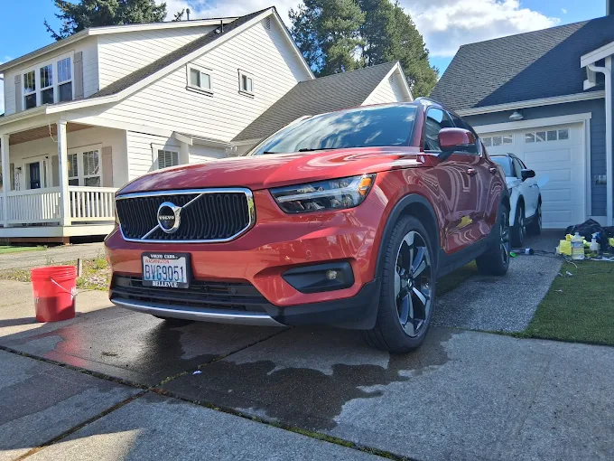 New oil filter installed during a driveway oil change
